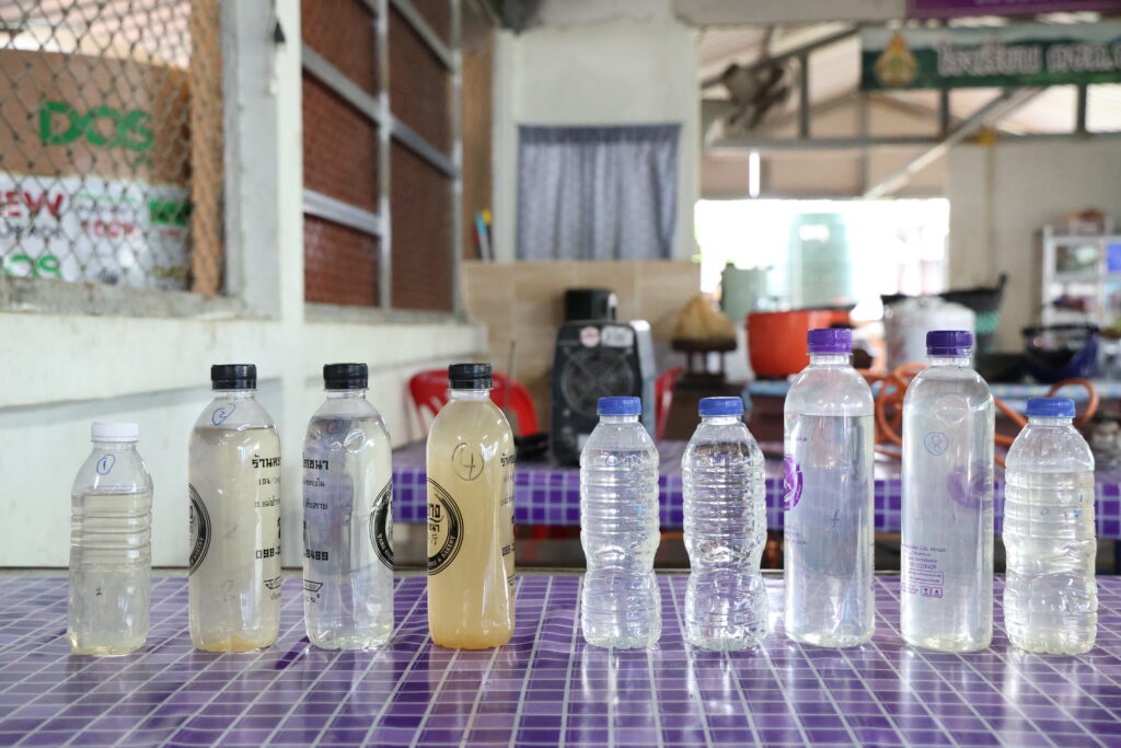 Water samples collected during field assessment, showing water quality challenges.